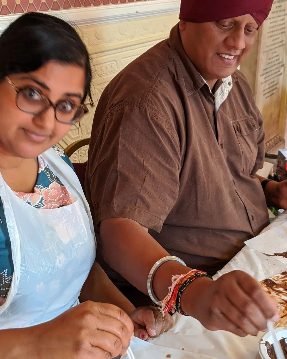 Two guests at a chocolate making class